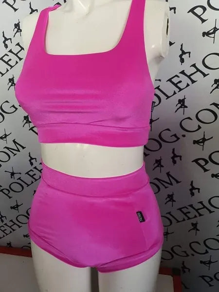 Bright pink smooth high waisted fitted pant.